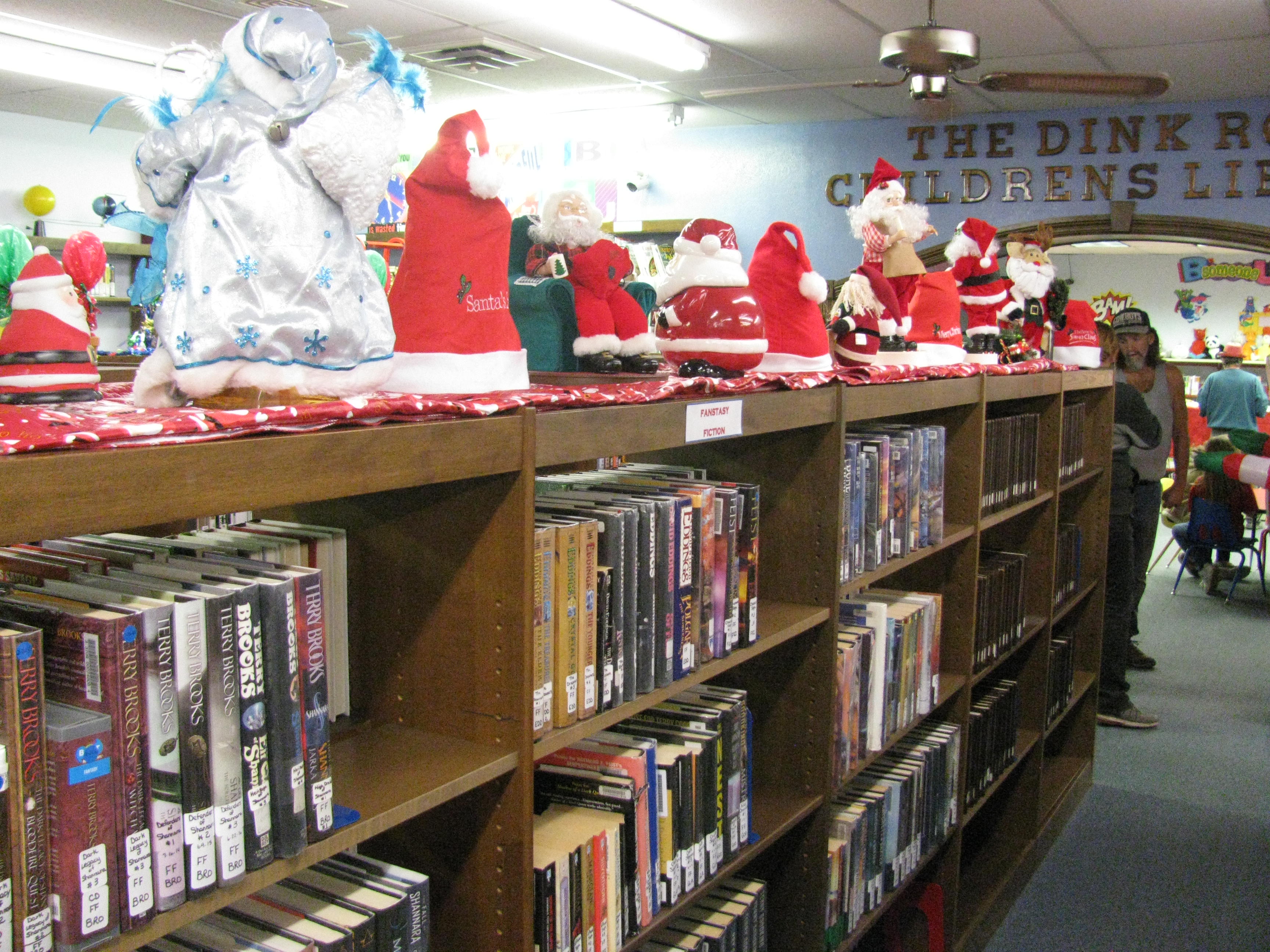 THE DECORATING OF THE LIBRARY