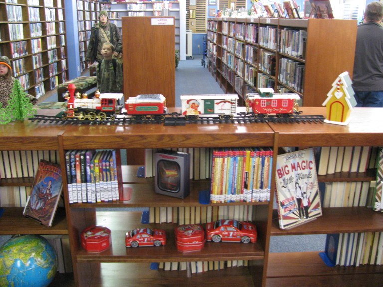 THE DECORATING OF THE LIBRARY