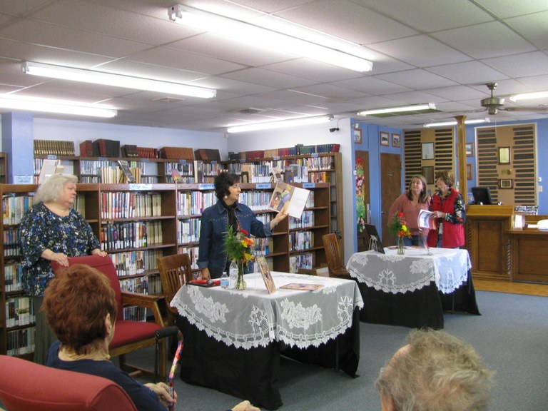 Janis Blackwell reading from her book.JPG